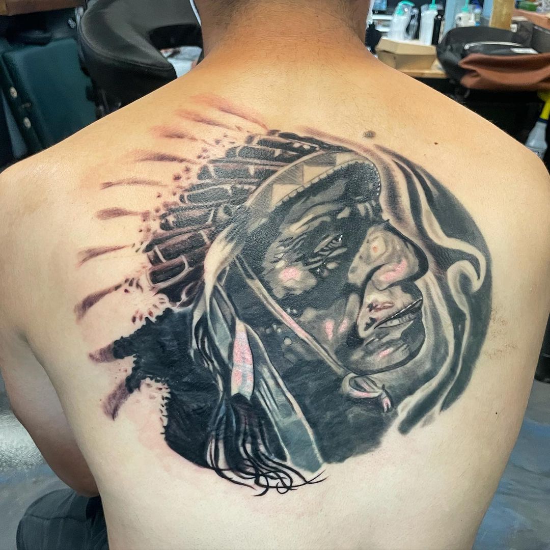 native-elder-black-grey-back-tattoo